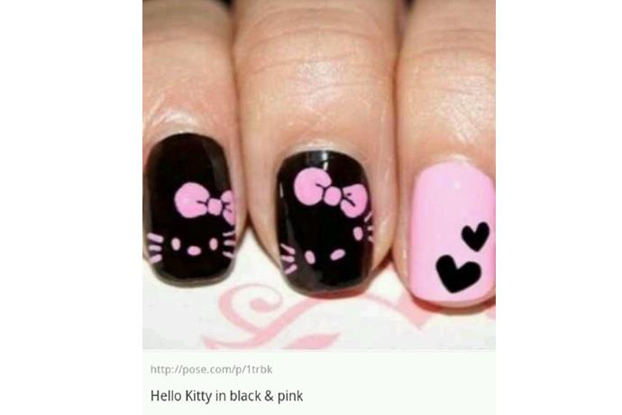 foto de uñas decoradas con estilo hello kitty negro