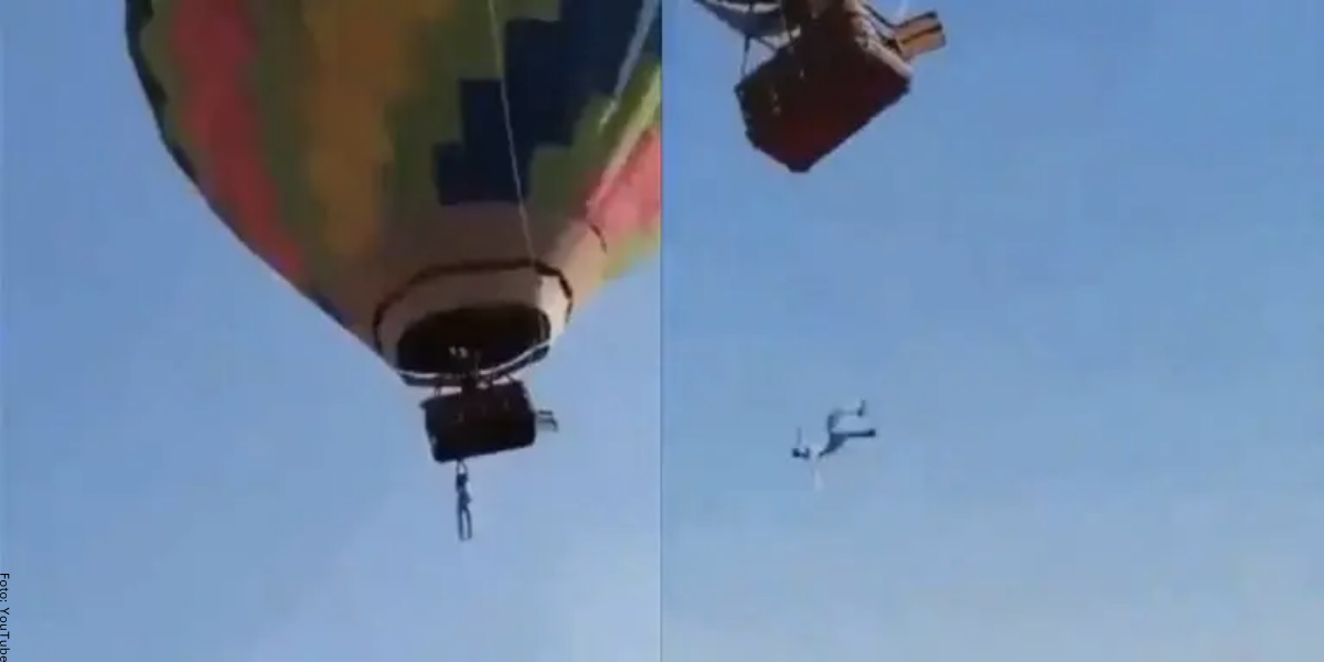 Hombre se sostiene de un globo aerostático mientras intentan salvarlo