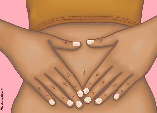 Foto de una ilustración de una mujer tomándose el abdomen