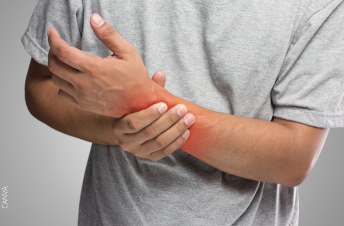Ilustracuión de una persona con un dolor en rojo en el brazo