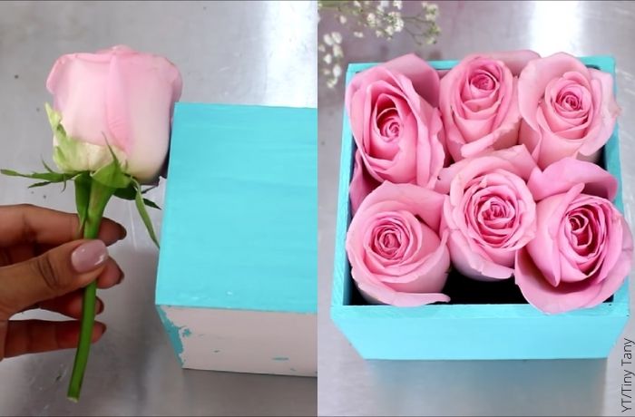 Fotos de un arreglo florar de rosas en una caja