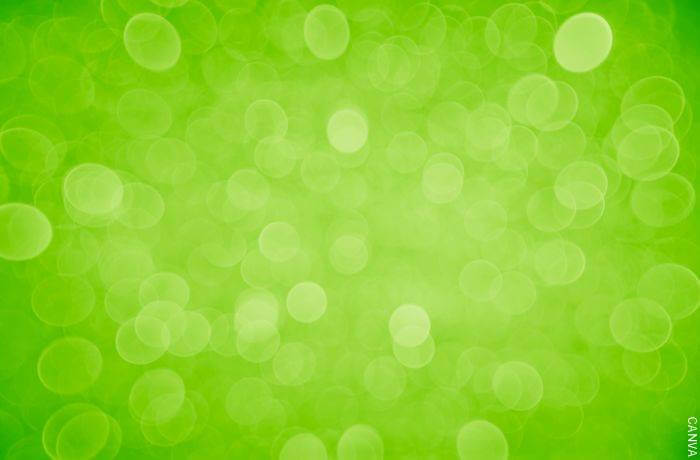 Ilustración de burbujas de luz sobre color verde biche