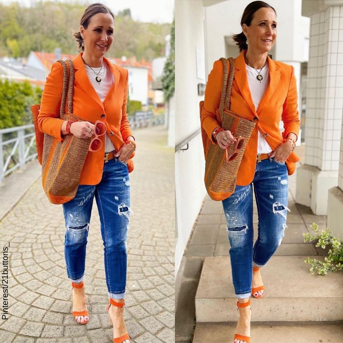 Fotos de una mujer con jean y blazer naranja