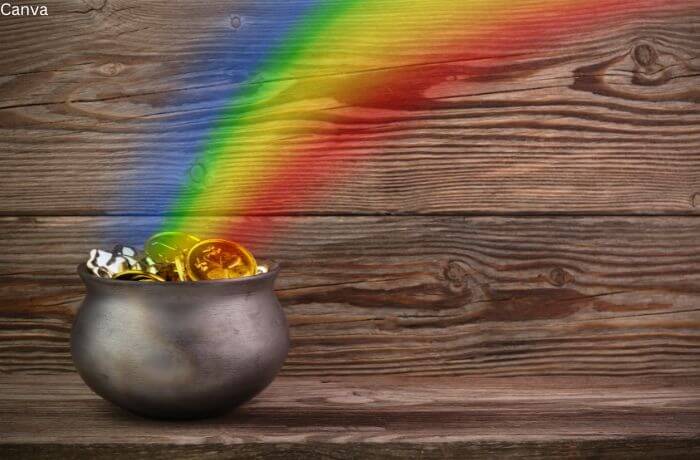 Ilustración de una olla de barro con oro y un arcoíris