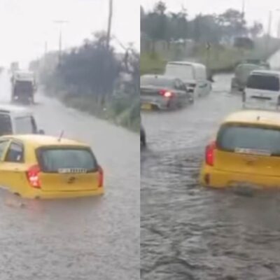 Taxi fue arrastrado por la lluvia